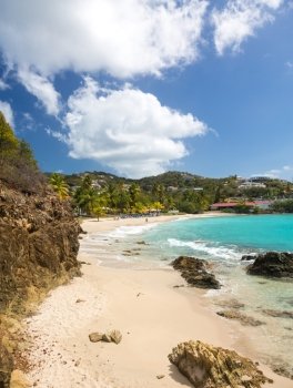 Vertical beach scene on island of St Thomas in US Virgin Islands USVI