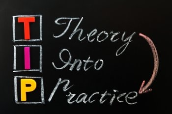 Acronym of TIP on a blackboard - Theory into Practice