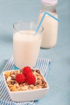 Healthy nutrition with fresh milk and muesli
