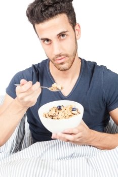 photo of man who is eating cornflakes for breakfast