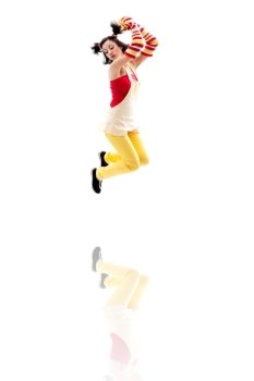 Latina girl wearing red yellow clothes jumping with reflection, isolated