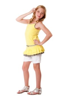 Beautiful cute blond young teenager girl wearing fashion clothes, yellow layered shirt withy white shorts and belt, isolated.