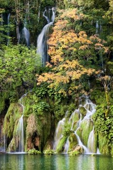 Scenic autumn landscape with beautiful waterfalls