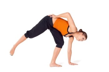 Fit attractive young woman doing first stage of yoga exercise called Half Moon Pose, isolated on white background