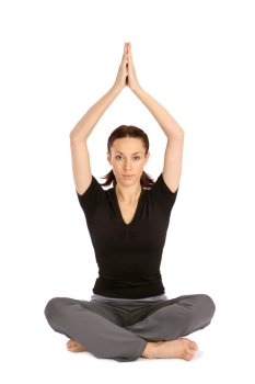 Pretty young woman practicing yoga sitting asana, isolated on white background