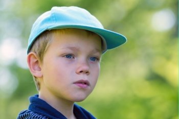 A young child with a cap