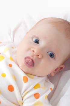 Closeup of Cute Toddler Baby With Lolling Tongue