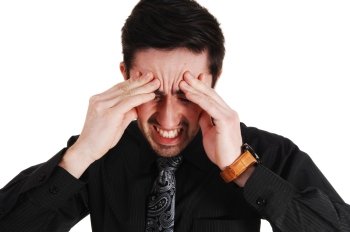 A closeup picture of a businessman holding his head for heavy headacheisolated for white background.
