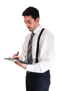 A young man in a white shirt and black tie and suspender writing onhis clipboard, isolated for white background.