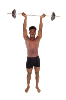 A young African American man in black underwear lifting weight, bare feet,isolated for white background.