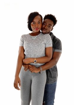 A young African American couple standing isolated for white background.