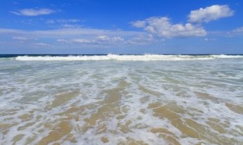 Surf waves on the beach, Atlantic Ocean.