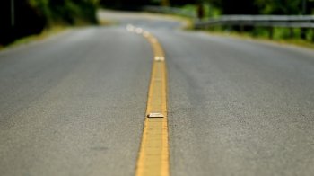 Yellow dividing line on the road