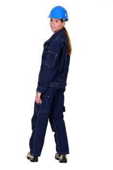 Female worker wearing overalls