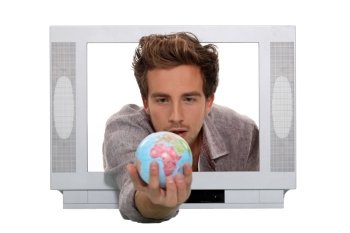 Man inside television holding globe
