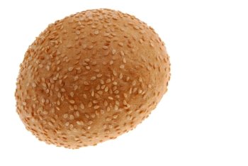 bun for sandwich. A bakery product strewed by grains