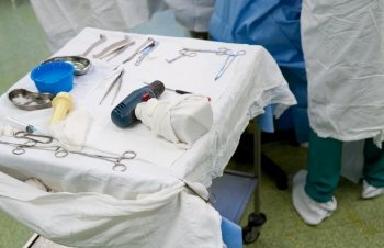 surgical instruments on a table in a real operating room