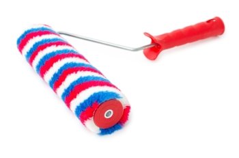 a new paint roller, with colourful stripes, over white