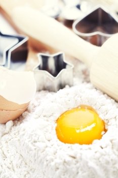Baking cookies: eggs, flour and baking forms