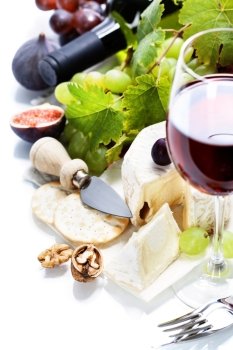 Wine, grape and cheese over white