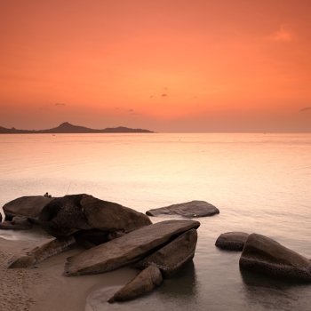 Sunrise at rocky seascape, Koh Samui Island, Thailand 