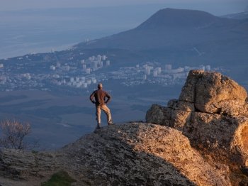 Man on the top of the mountain