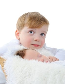 little boy looks at the sleeping brother. Isolated on white background