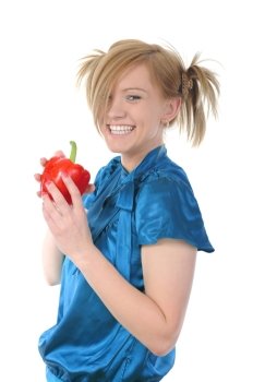 Beautiful smiling girl holding a red pepper. Isolated on white background