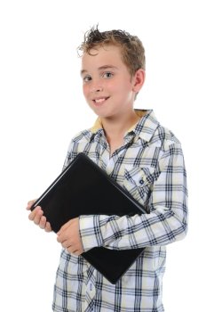 Happy little boy with laptop. Isolated on white background