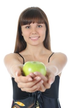 Athletic girl holding a green apple in hand. Isolated on white background