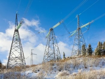 winter mountain landscape with high-voltage current line