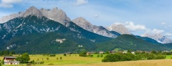 Alps mountain country tranquil summer panorama (Austria, Gosau village outskirts). Two shots composite picture.