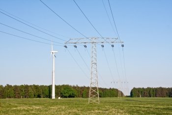 windmill together with high voltage powerlines