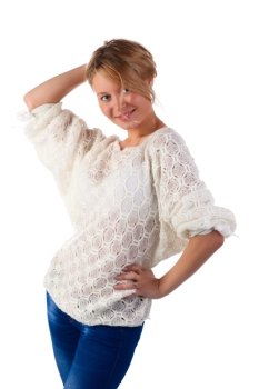 Young blonde woman in knitted sweater.