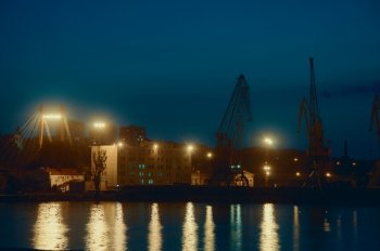 Port Cranes At Night. Odessa seaport. HDR image.