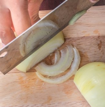 Chopping Onion Representing Food Preparation And Chopped