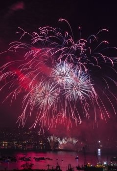 Growing red fireworks over Lake Union Washington 