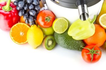 Juicing machine, fresh fruits and vegetables over white background.