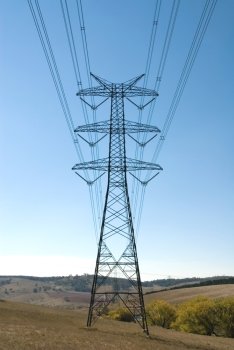 High voltage power lines supported by a steel stanchion