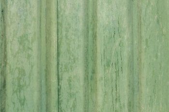 Painted grunge green tin wall suface as background