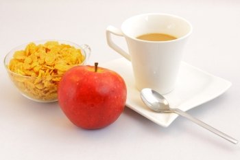 morning breakfast wihf apple, coffee and cereals