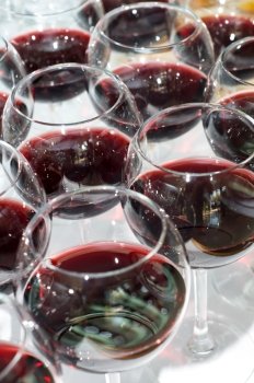 group arrangement of glasses with red wine, selective focus. red wine glasses, selective focus