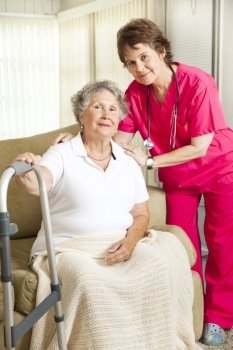 Dignified senior woman in a nursing home, with a caring nurse.  