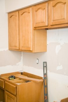 Kitchen remodeling in progress.  Solid maple cabinets are being installed.  