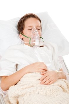 Little boy sick in the hospital, breathing with the help of a respirator.  