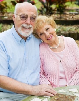 Beautiful senior couple in love in an outdoor setting. 