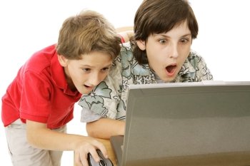 Two brothers shocked by what they are seeing on the internet.  Isolated on white.  
