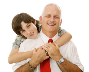 Portrait of handsome father and loving son.  Isolated on white.  