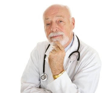 Portrait of an intelligent, thoughtful doctor isolated on white.