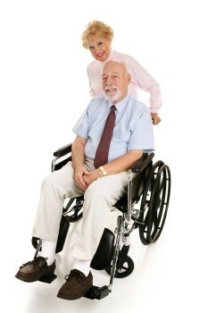 Senior man in a wheelchair with his loving wife pushing him.  Full body on white.  